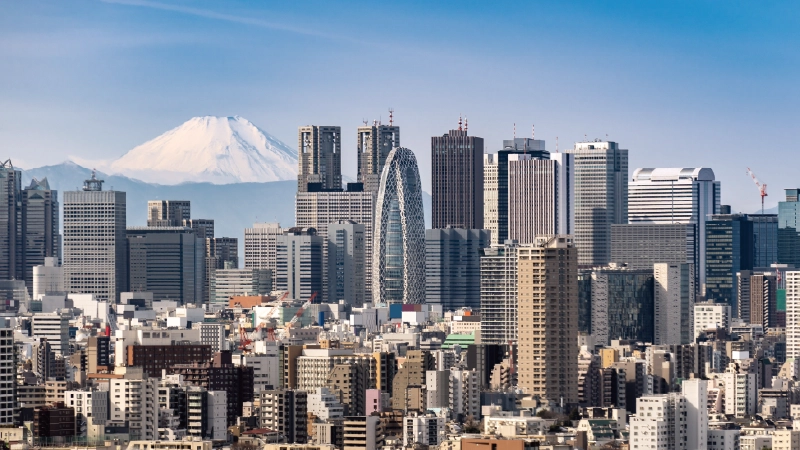 カートピア 東京都内からビル群越しに遠望した富士山の写真 | SUBARU