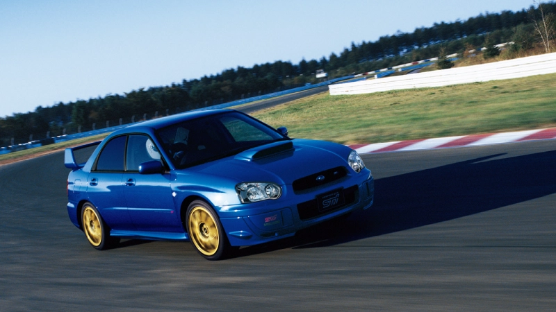 カートピア 2002年11月発売のインプレッサWRX（GD/GG型）改良モデルがサーキットを走る様子。 | SUBARU