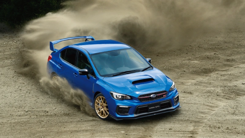 カートピア EJ20 Final Editionが土埃を上げながら急旋回する様子。 | SUBARU
